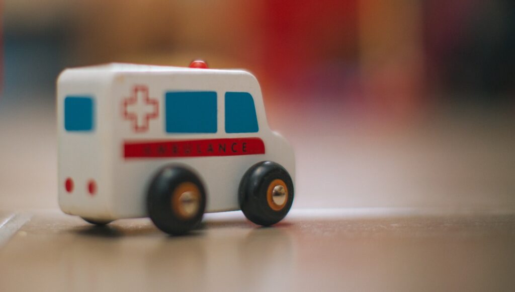 types of fostering
a toy ambulance is sitting on the floor