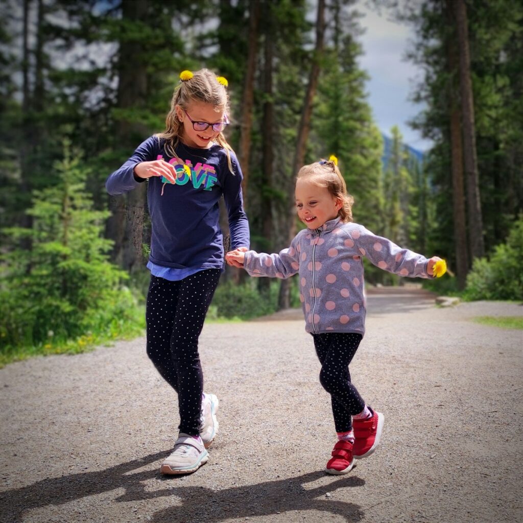 types of fostering two little girls playing together